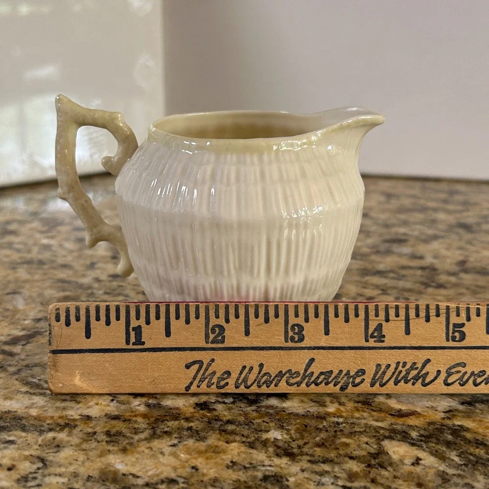 Belleek Neptune Creamer 3.25in Ivory Yellow Shell Pattern Coral Handle Vintage